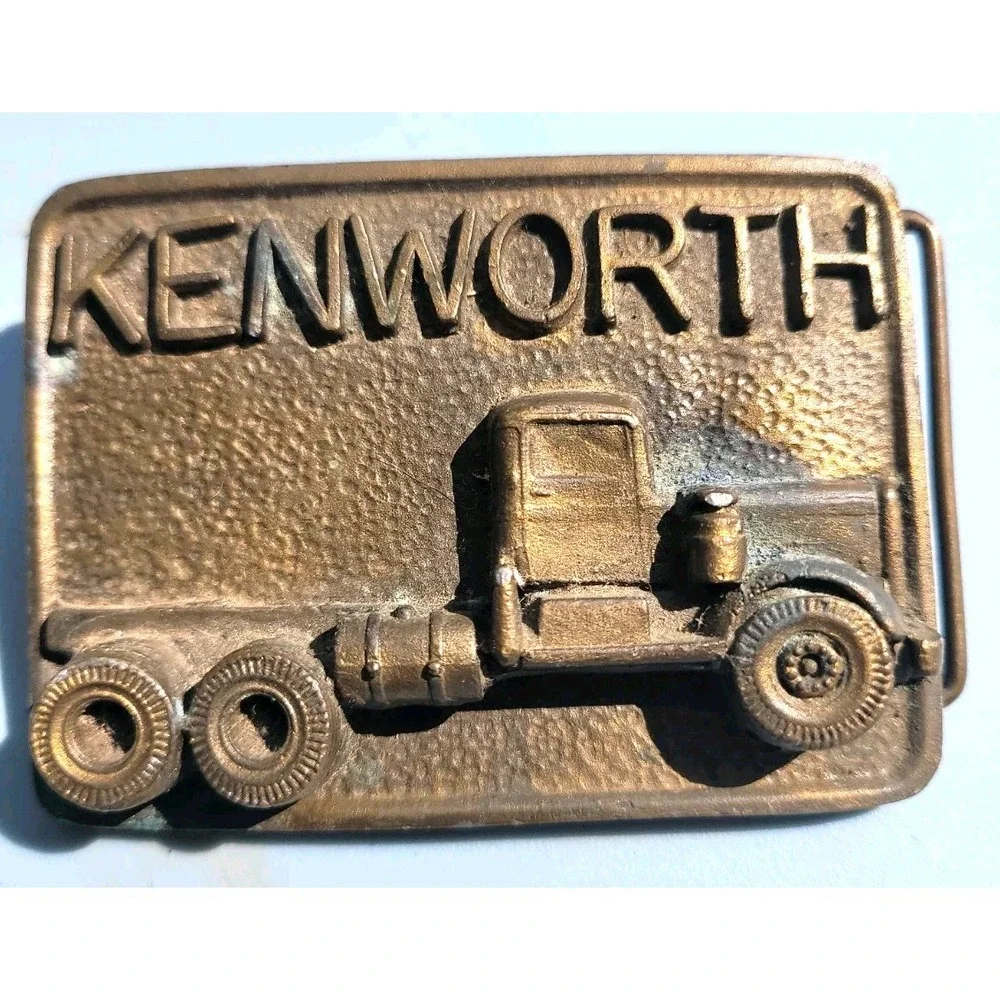 1975 Heavy Solid Brass Kenworth Belt Buckle 1/2 Pound. Nice Patina Rare